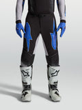 Alpinestars Supertech Hiten AFD broek, heren-motocrossbroek, zwart en blauw, lichtgewicht stretch ripstop constructie.