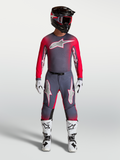 Alpinestars Supertech Hiten AFD Gear Set en broek, professionele motocrossuitrusting voor heren, grijs en fluo rood.