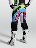 Alpinestars Supertech Dyna broek voor heren, motorcrossbroek in paars, groen en zwart, performance fit met geitenleren kniepanelen en perforaties.
