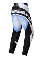 Alpinestars 2025 Techstar Melt crossbroek, motorcross broek, zwart, wit en blauw met verlopend smelteffect, achteraanzicht met groot wit logo over de heupen en sterlogo's op de dijen, sportief ontwerp voor off-road racen
