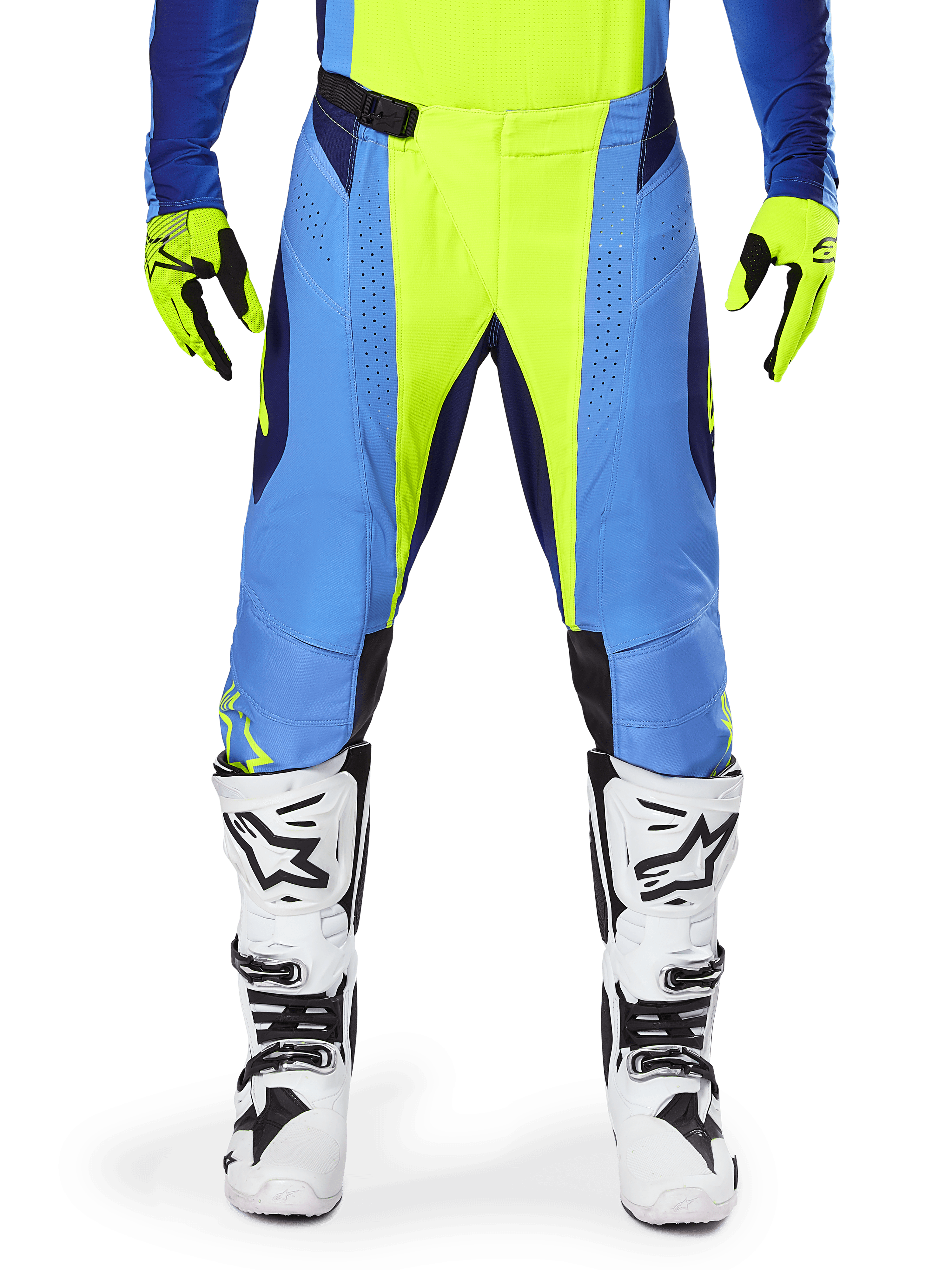 Alpinestars 2025 Techstar Melt broek, motorcrossbroek, fluorescerend geel en blauw, gedragen met bijpassende handschoenen en witte laarzen, met blauwe panelen en fluogele accenten, prestatiegericht ontwerp voor off-road racing