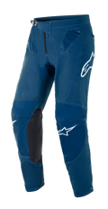 Alpinestars Supertech Blaze Pants, Motocross Off-Road Pants, Dark Blue, featuring black leather inner knee panels, white Alpinestars logo branding on the thigh and leg, adjustable ratchet waist buckle, and mesh ventilation zones at the hips.