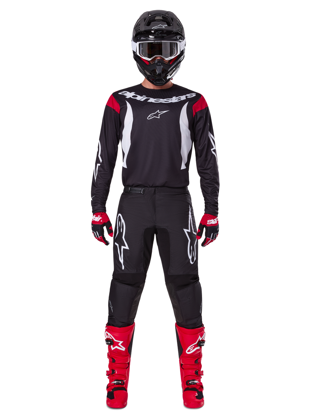 Alpinestars 2025 Fluid Haul Gearset, motorcrosser in volledige race-uitrusting, zwart jersey met rode schouderaccenten en witte logo's, zwarte broek met witte ster-branding, felrode laarzen, rood-zwarte handschoenen, zwarte helm met witte crossbril, op elkaar afgestemde off-road performance-look