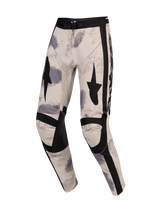 Alpinestars 2026 Racer Lahnd Broek, motorcrossbroek, Sand Camo, met gebroken witte basis en grijze en zwarte penseelstreekpatronen, zwarte ster-graphics op de dijen, versterkte zwarte kniepanelen en verstelbare gesp in de taille, ergonomisch off-road racing-ontwerp