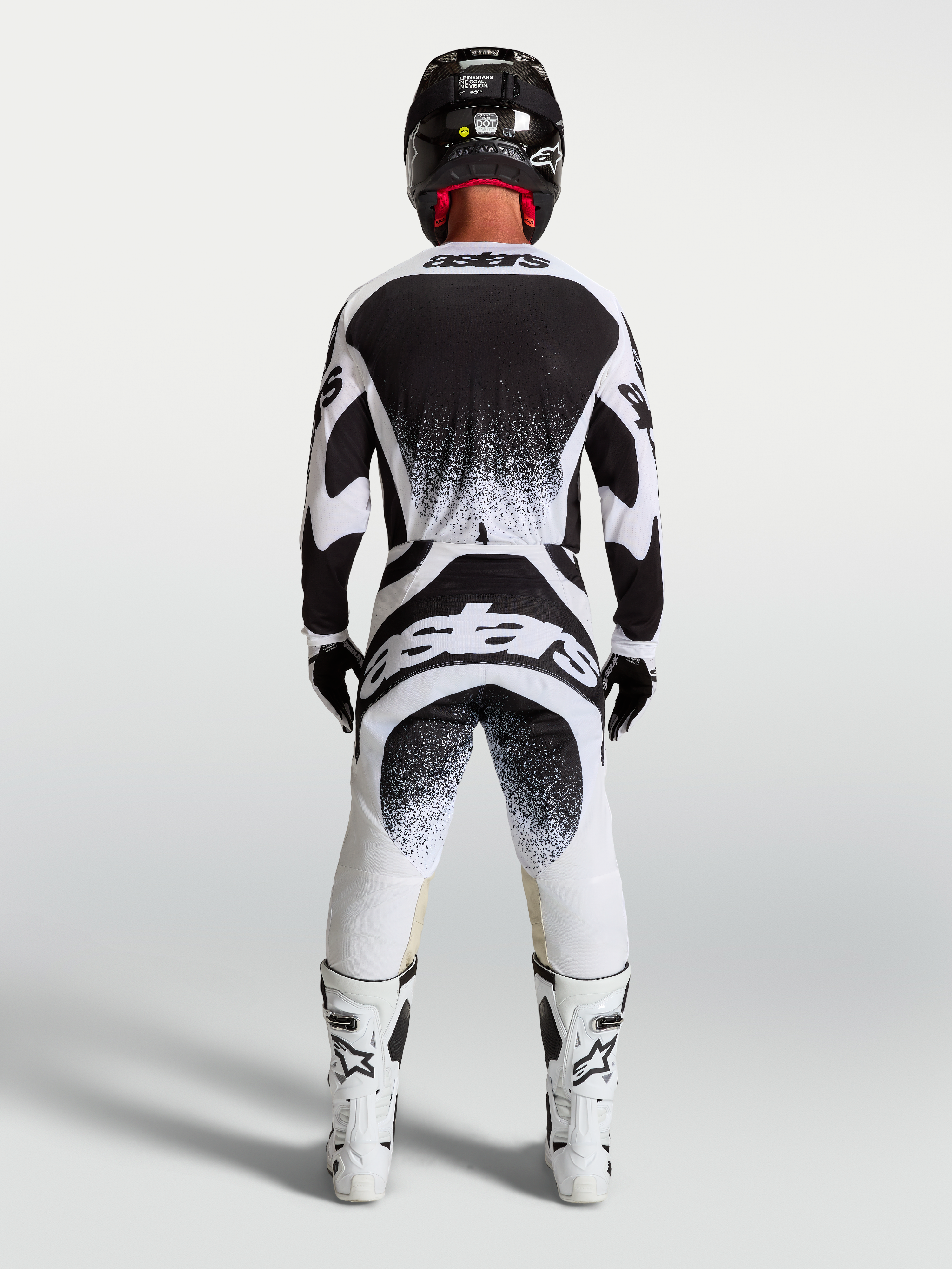 Alpinestars Techstar Swan Pants and Jersey, Men's Motocross Gear Set in Black and White with athletic race-fit and back branding.