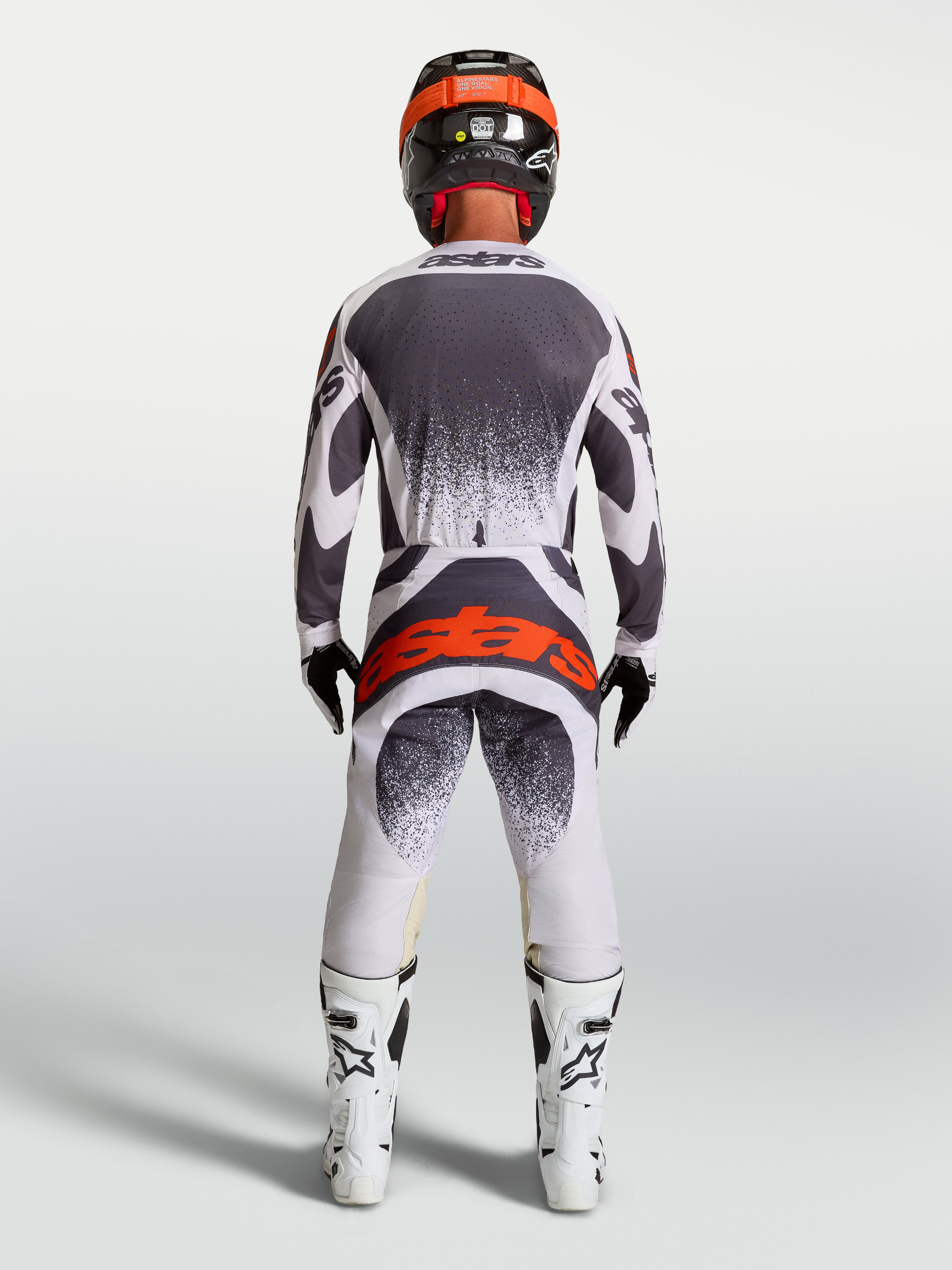 Alpinestars Techstar Swan broek, heren motocross-uitrusting, lichtlila en donkergrijs met rood fluo, achteraanzicht.