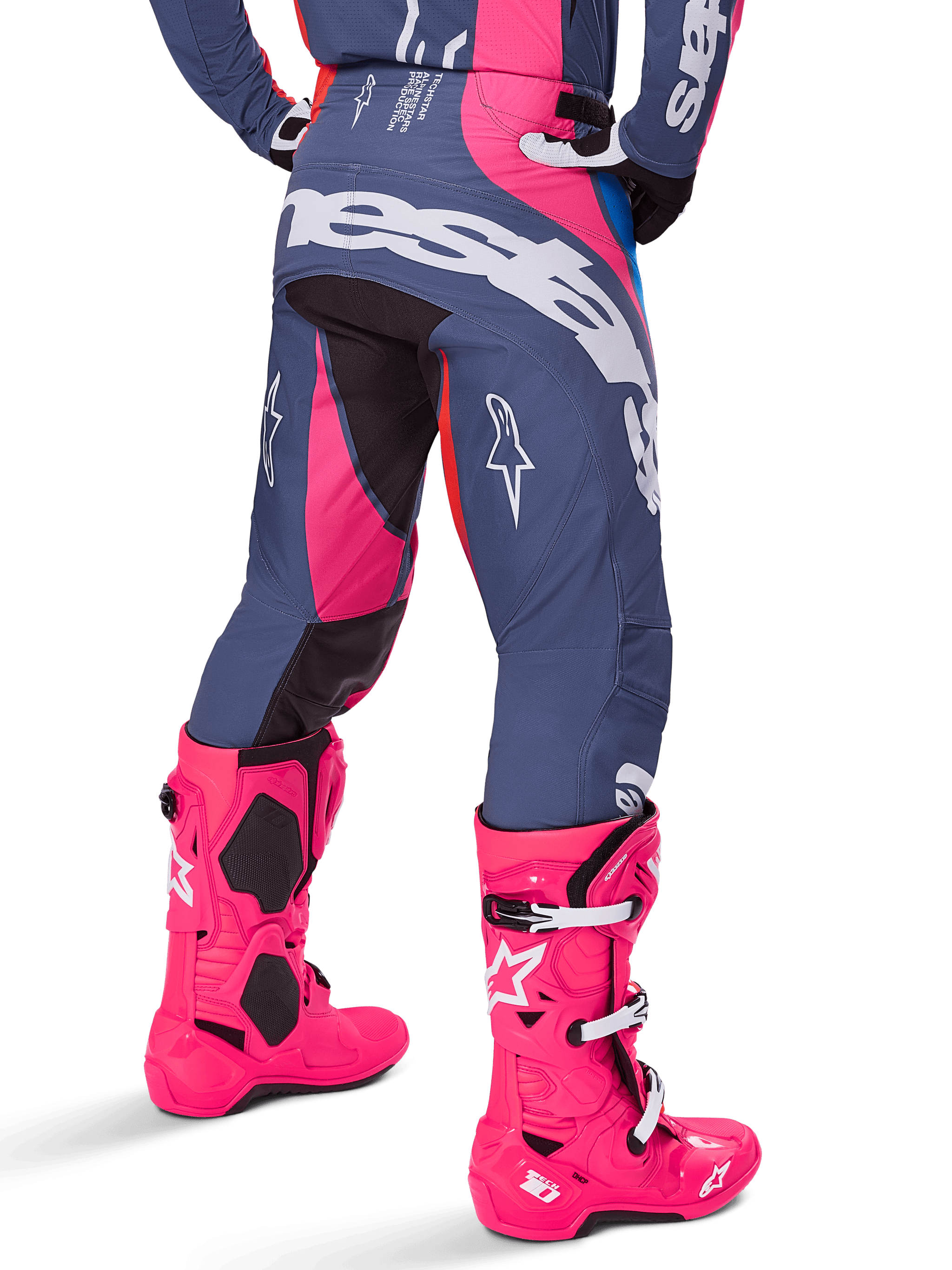Alpinestars 2025 Techstar Dreem Pants, Motocross Pants, Gray and Bright Pink, worn with matching pink boots, featuring large white Alpinestars branding on the seat and star logos on the legs, durable athletic race fit for off-road performance