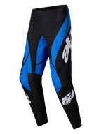 Alpinestars 2025 Techstar Dreem crossbroek, motorcross broek, zwart en blauw, voorzien van witte Alpinestars-logo's, opvallende hoekige blauwe panelen op een zwarte basis, atletisch ontwerp met versterkte kniezones voor off-road prestaties.