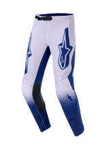 Alpinestars 2026 Supertech Scenz broek, motorcrossbroek, lichtgrijs en donkerblauw, met een groot blauw Astars-logo op de dij, zwarte leren binnenkniepanelen en geperforeerde ventilatieopeningen, kleurverloop op de onderbenen, professionele race-uitrusting voor off-road prestaties