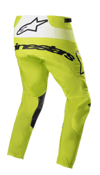 Alpinestars 2023 Techstar Push broek, motorcross broek, fluorgeel en wit, driekwart achteraanzicht met zwarte branding en wit achterpaneel met sterlogo, zwarte patches aan de binnenkant van de benen, duurzame off-road race-uitrusting