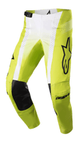 Alpinestars 2023 Techstar Push broek, motorcrossbroek, felgeel en wit met zwarte accenten, voorzien van zwarte lederen knieversterkingen aan de binnenzijde, geperforeerde ventilatiepanelen, groot zwart logo op de dij en een verstelbare gespsluiting in de taille, hoogwaardige off-road uitrusting