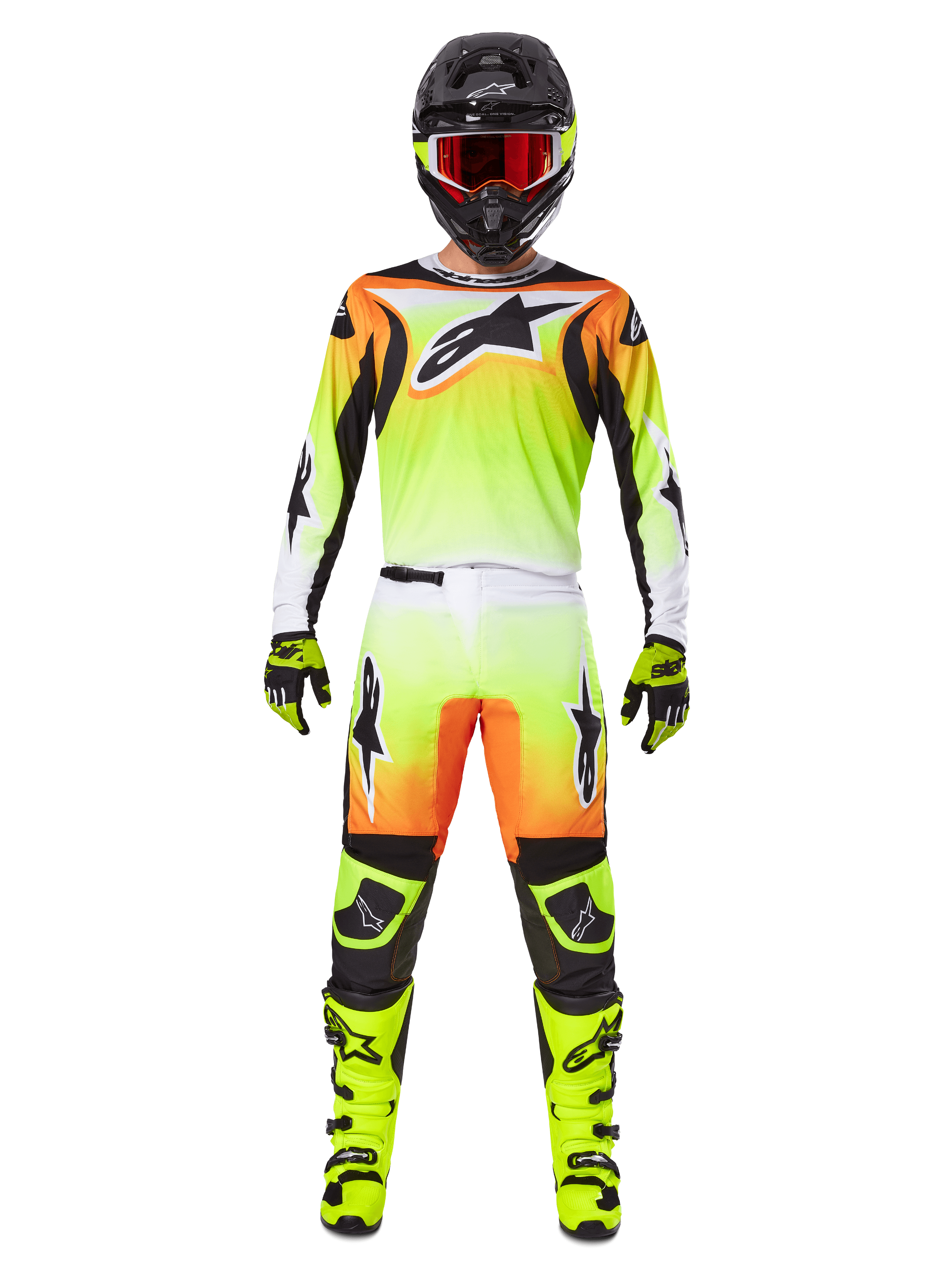 Alpinestars 2025 Fluid Wurx broek, motorcross broek, geel en zwart met oranje en wit kleurverloop, gedragen met bijpassende jersey, felgele laarzen en zwarte helm met rode bril, volledige motorcross race-uitrusting
