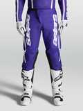 Alpinestars Fluid Apex V2 broek, heren motocrossbroek in donkerblauw en wit, gedragen voor off-road prestaties.