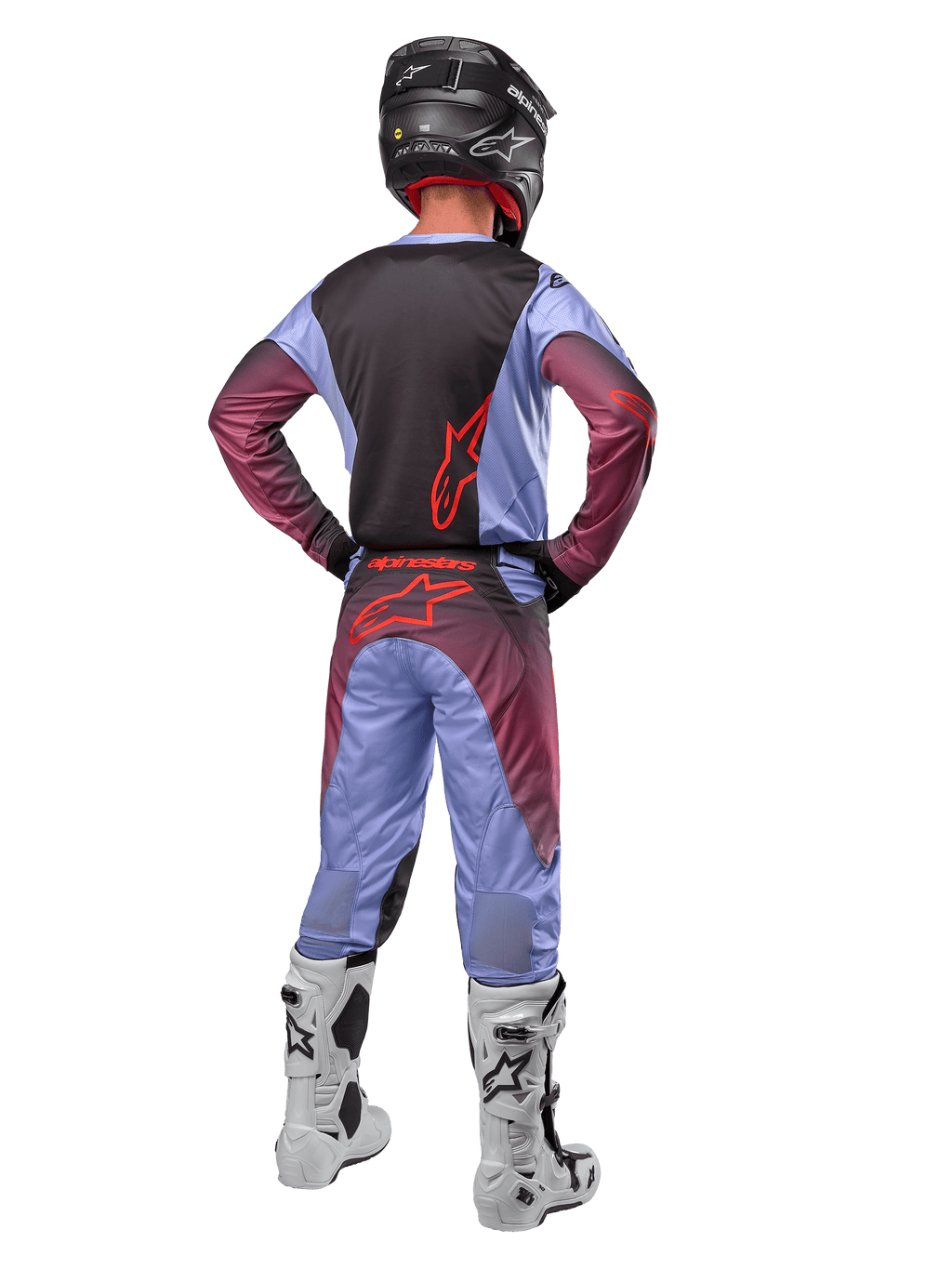 Alpinestars 2024 Racer Hoen Jersey en Broek, Lavan Purple Black, volledig achteraanzicht van motorcrossrijder met bijpassende uitrusting, wit-zwarte laarzen en een zwarte helm.