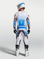Alpinestars Fluid Drag broek, motocross off-road broek, grijs en blauw, ergonomische 3D-pasvorm en verstevigd zitvlak.