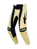 Alpinestars Techstar Atrox Men's Motocross Pants in Cream and Black with laser-cut ventilation for off-road performance.