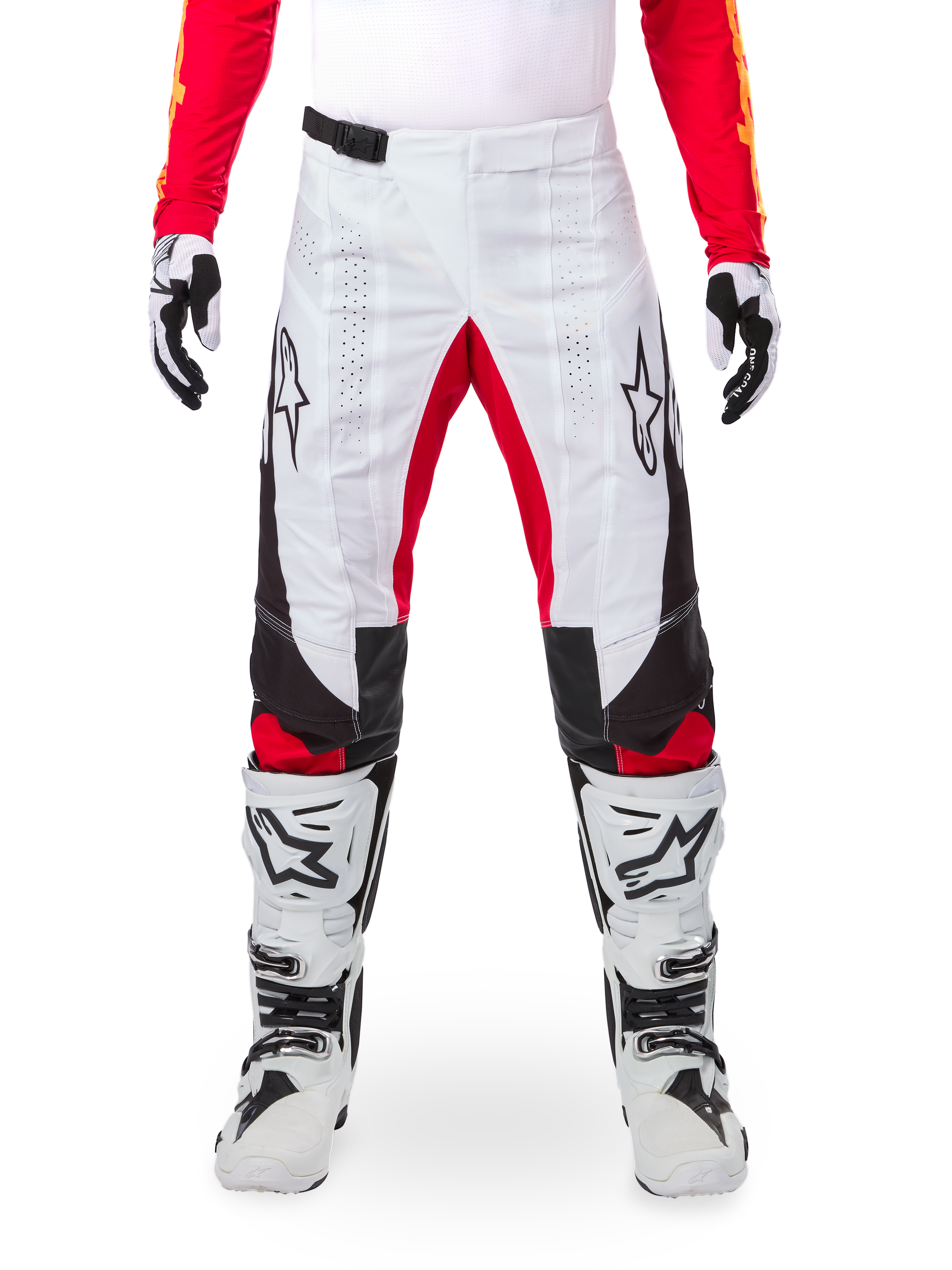Alpinestars Limited Edition Techstar Deep Pants, Motocross Pants, White with Black and Red accents, featuring star logo and laser perforations, worn with white motocross boots and gloves, durable technical material for off-road riding