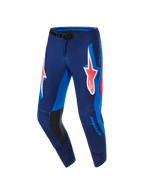 Alpinestars 2026 Supertech Vista Pants, Motocross Pants, Dark Navy Hot Coral Cobalt, featuring a large coral Astars logo on the thighs, bright blue side panels, black leather inner knee reinforcements, and laser-cut perforations for ventilation, designed for elite performance racing.