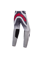 Alpinestars Jeugd Supertech Swan broek, premium motorcross-racebroek in grijs en rood met een groot logo op de achterzijde en geventileerde panelen.