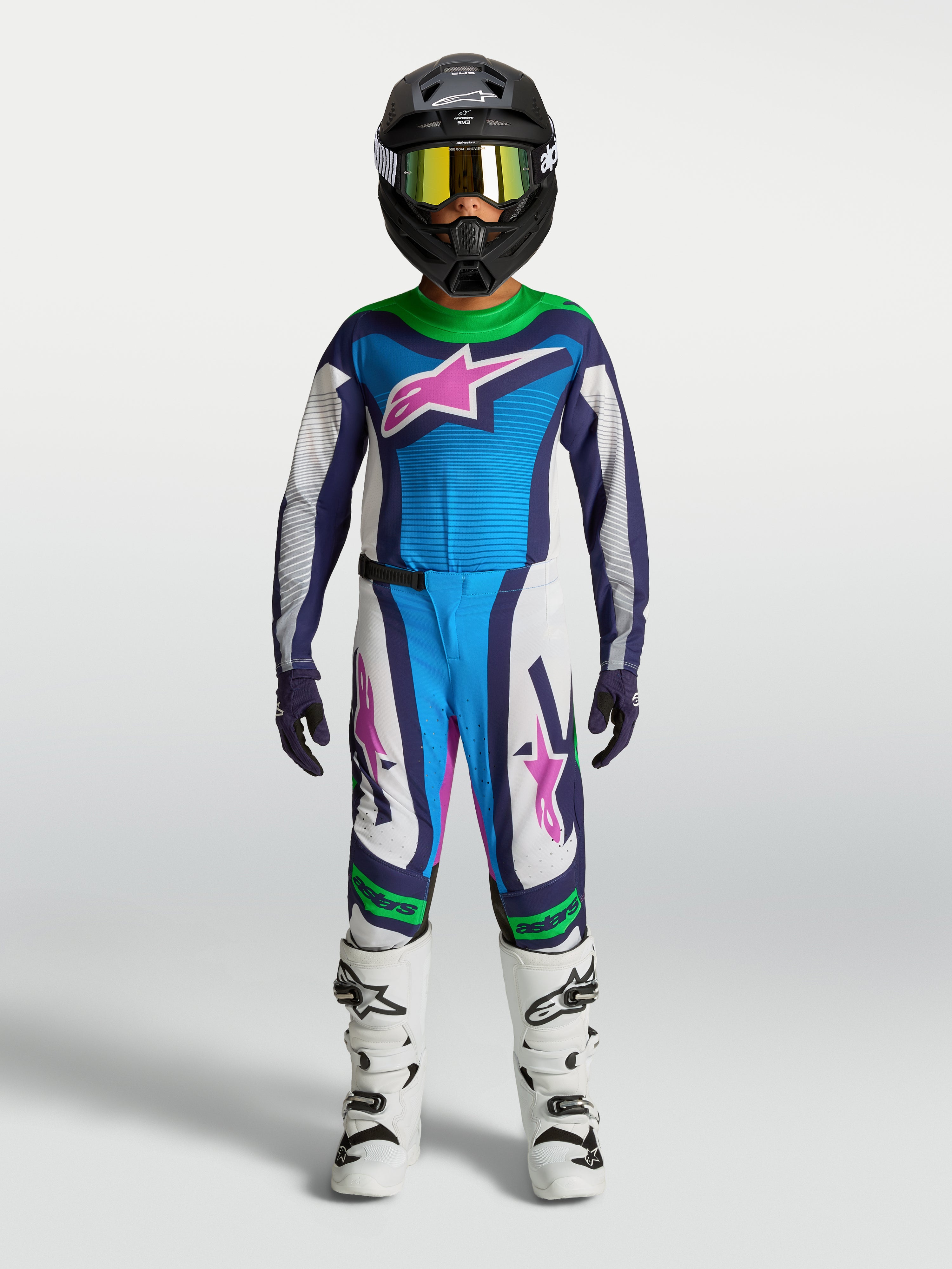 Alpinestars jeugd Supertech Maven broek en jersey, blauw en wit met fluorescerend groen, atletische pasvorm voor motocross.