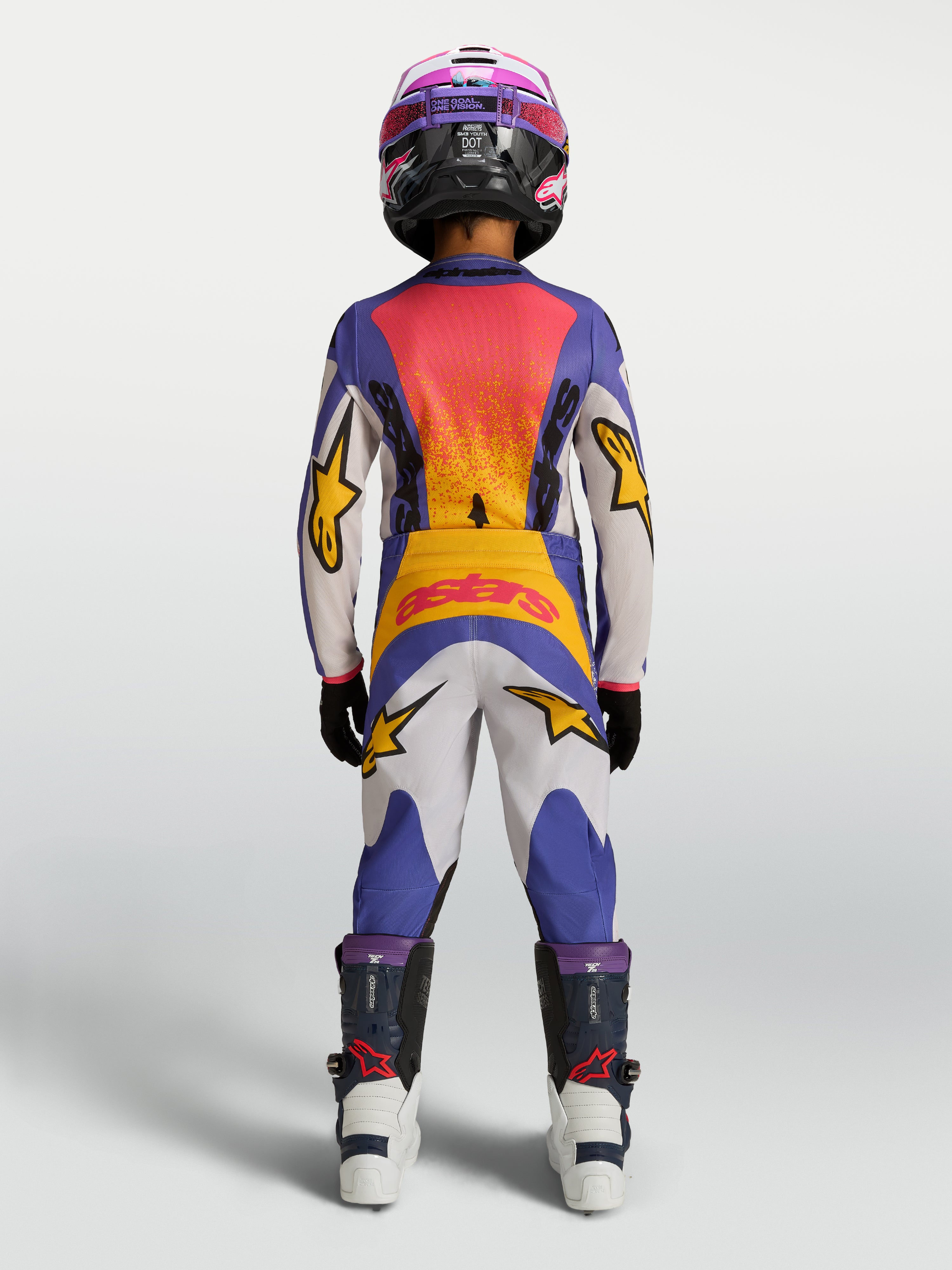 Alpinestars Jeugd Fluid Drag Broek, blauw-witte motorcrossbroek voor jeugd met gele accenten, duurzame off-road prestaties.