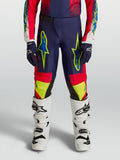 Alpinestars Jeugd Fluid Drag broek, jeugd-motorcrossbroek in navyblauw en vuurrood met neongele graphics.