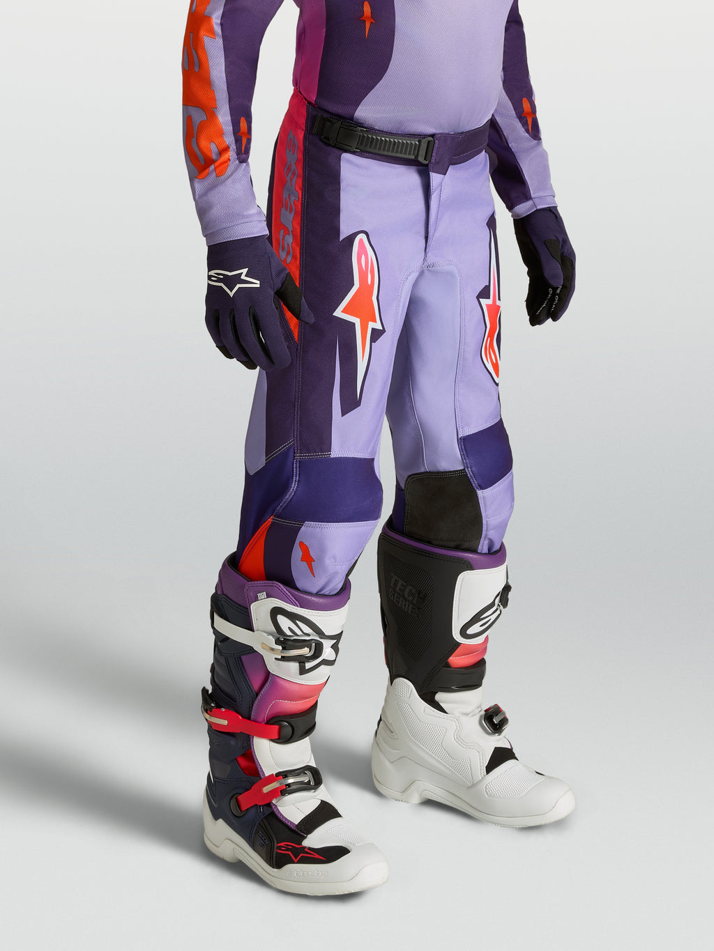 Alpinestars Jeugd Fluid Hunt broek, paarse en roze motocrossbroek met een ergonomische sport-fit voor jonge off-roadrijders.