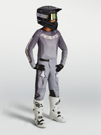 Alpinestars Jeugd Fluid Amber-broek in zand, motorcrossbroek voor kinderen met witte ster-graphics en voorgevormde sport-fit.