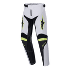 Alpinestars Youth 2024 Racer Lucent broek, motorcrossbroek, wit, zwart en fluogeel, sterlogo's op de dijen, zwarte panelen aan de binnenkant van de benen en knieën, sportief voorgevormd ontwerp voor motorcrossprestaties