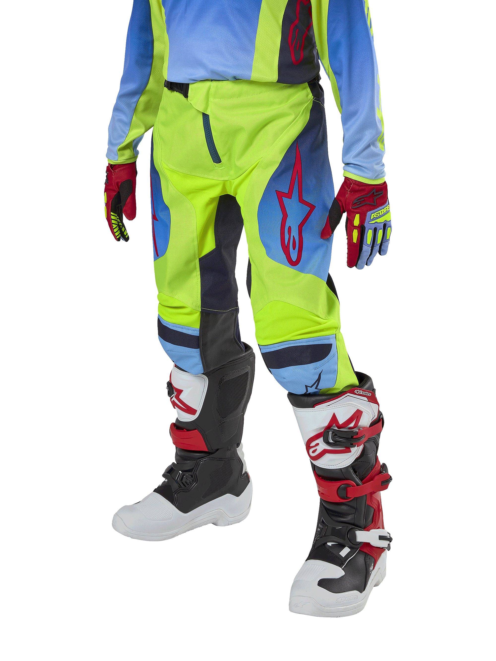 Alpinestars Youth 2024 Racer Hoen motorcrossbroek, jeugd crossbroek, neongeel en Blue Night Navy met rode accenten, gedragen met bijpassende handschoenen en witte, zwarte en rode laarzen, sportieve pasvorm en voorgevormde pijpen voor off-road racen
