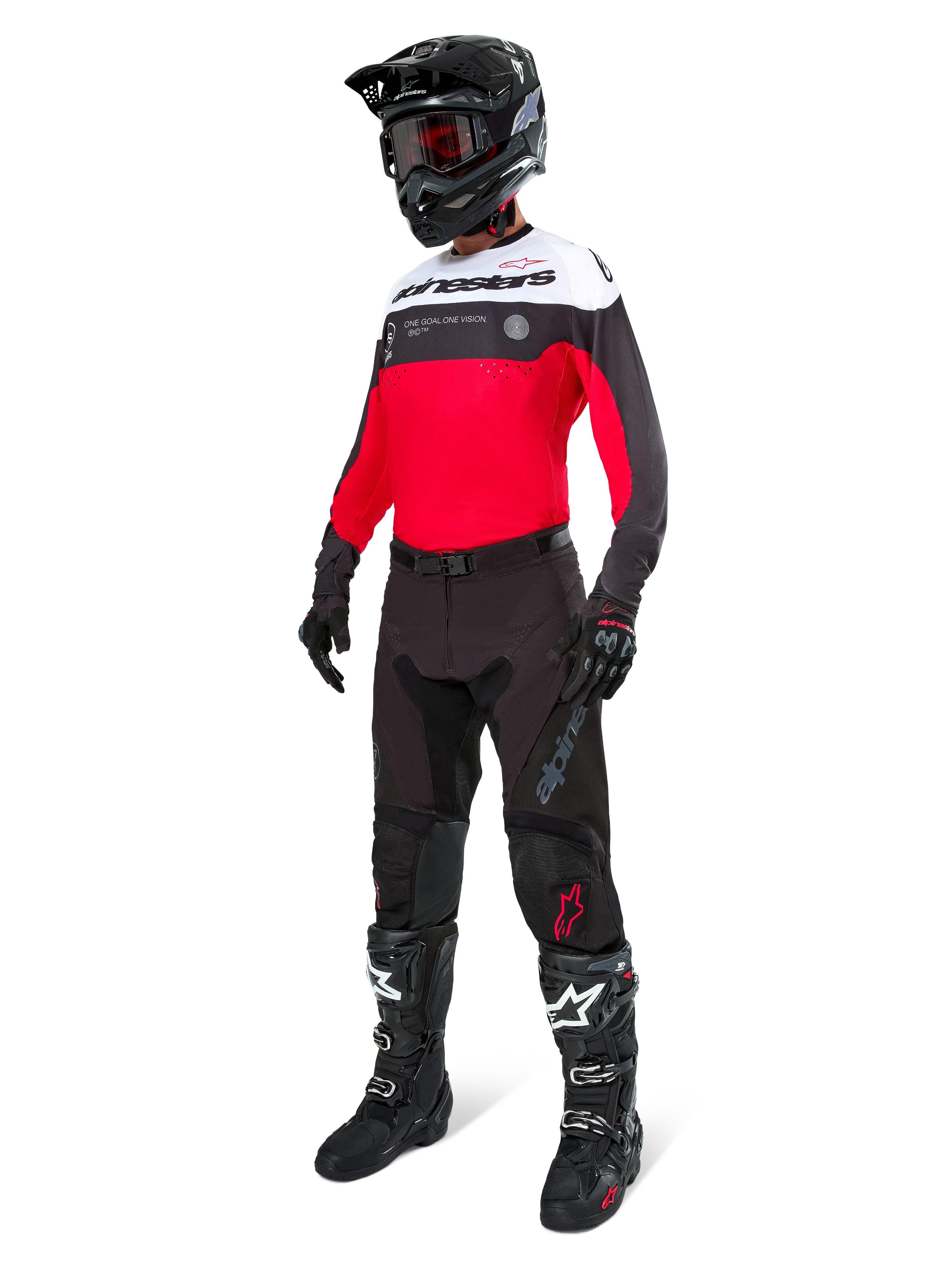 Alpinestars Pro-Dura Jersey, Motocross and Enduro Jersey, Black Bright Red and White, worn with black pants, black helmet, and black and white boots, featuring bold chest branding and laser perforations, high-performance gear for off-road riding