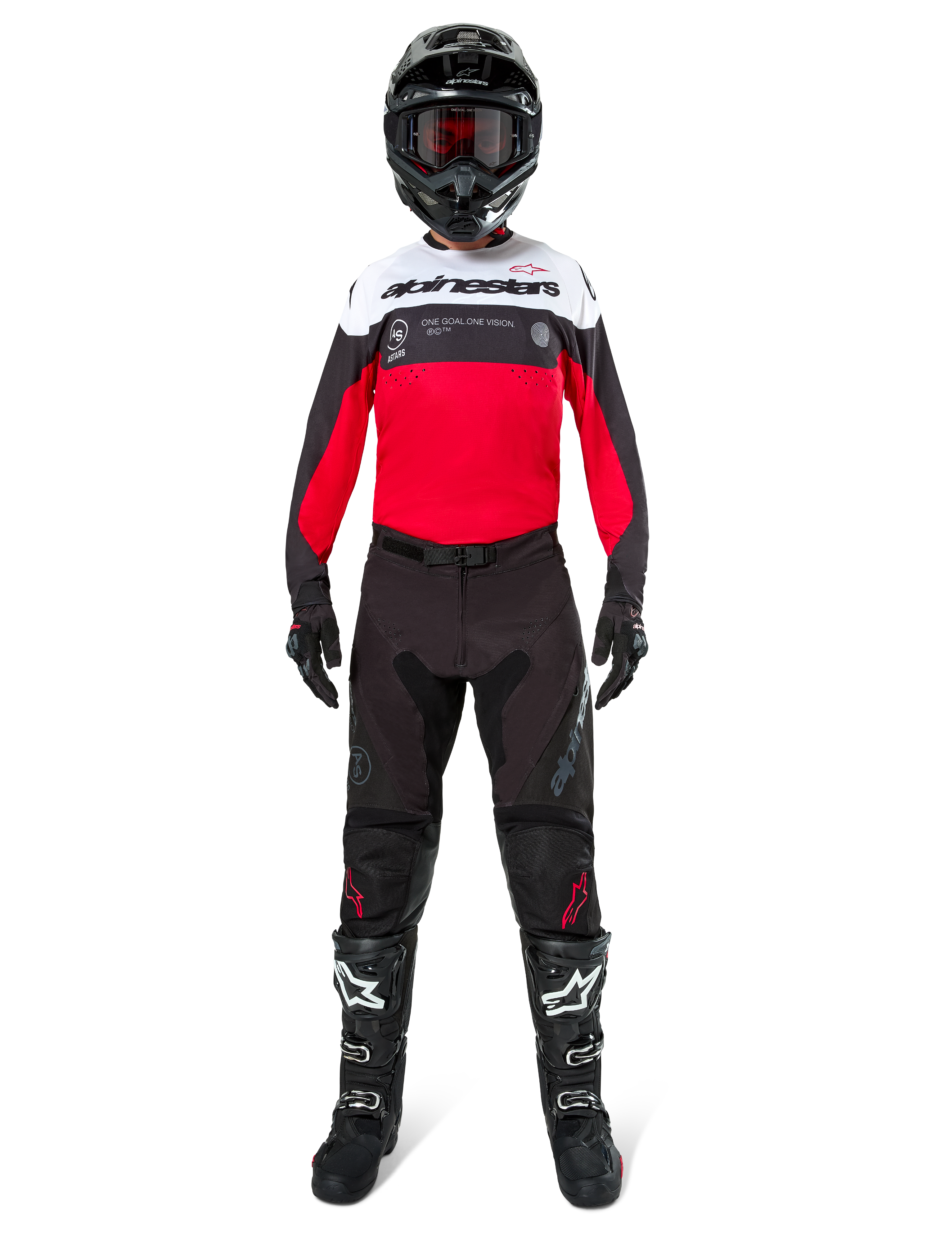 Motocross rider wearing the Alpinestars Pro-Dura Jersey in Black, Bright Red, and White, paired with black pants, black boots, and a black helmet, complete off-road racing gear.