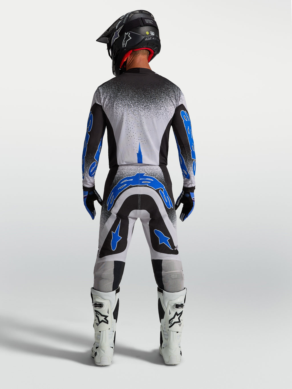 Alpinestars Supertech Hiten AFD Jersey and Gear Set, men's motocross outfit in black, white, and blue for performance.