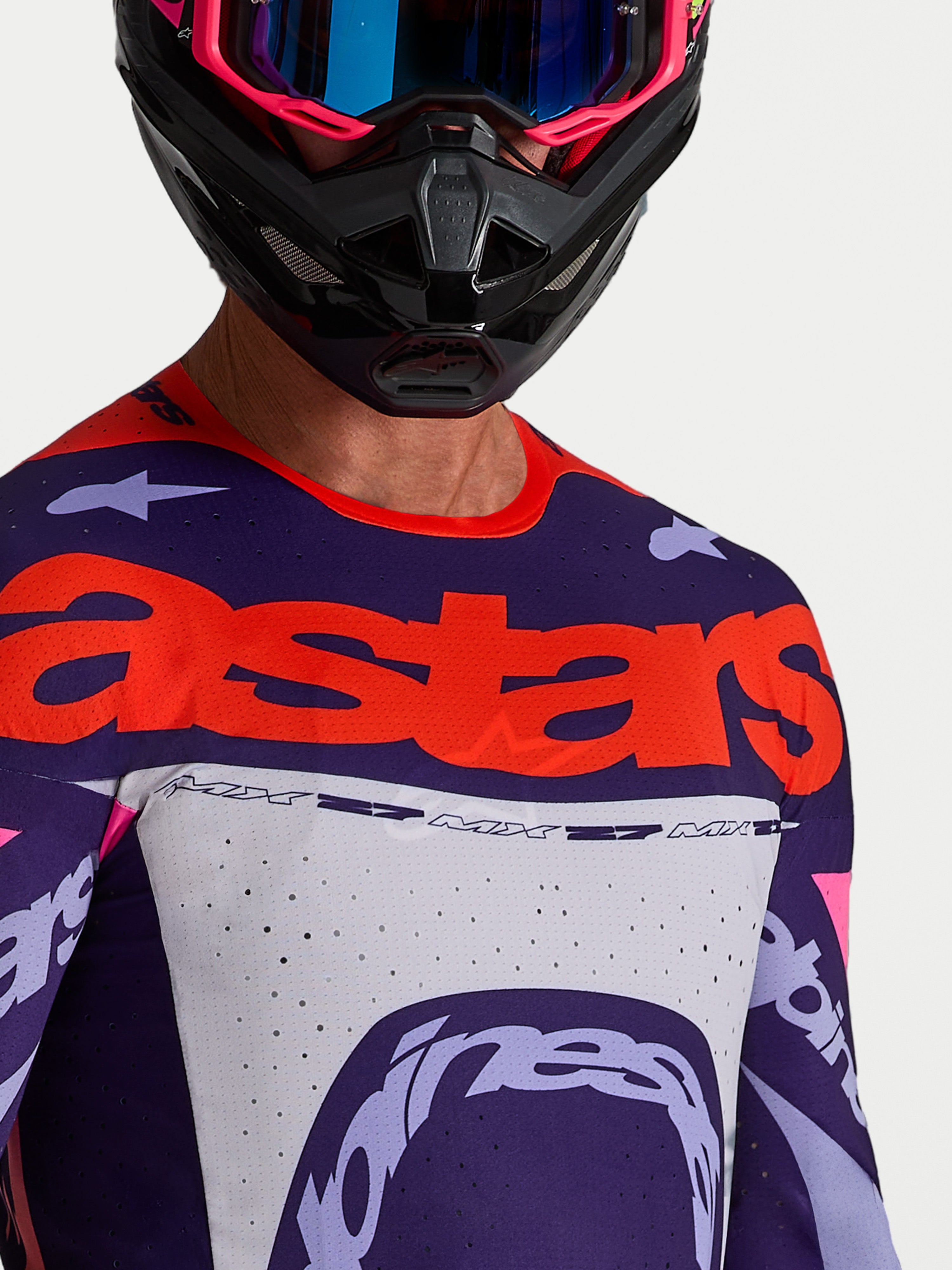 Alpinestars Supertech Dyna Jersey, motorcrossjersey voor heren, paars en roze, met lasergesneden mesh en rode logo's.