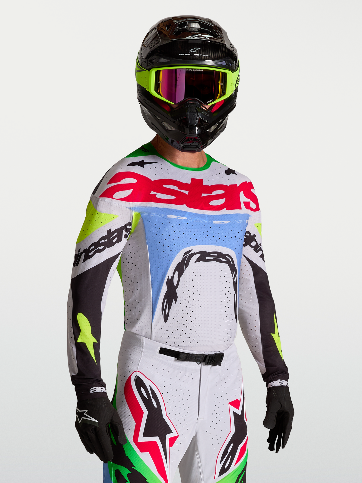 Alpinestars Supertech Dyna heren-motorcrossjersey, licht lila en fluorgroen, stretch mesh met lasergesneden ventilatie.