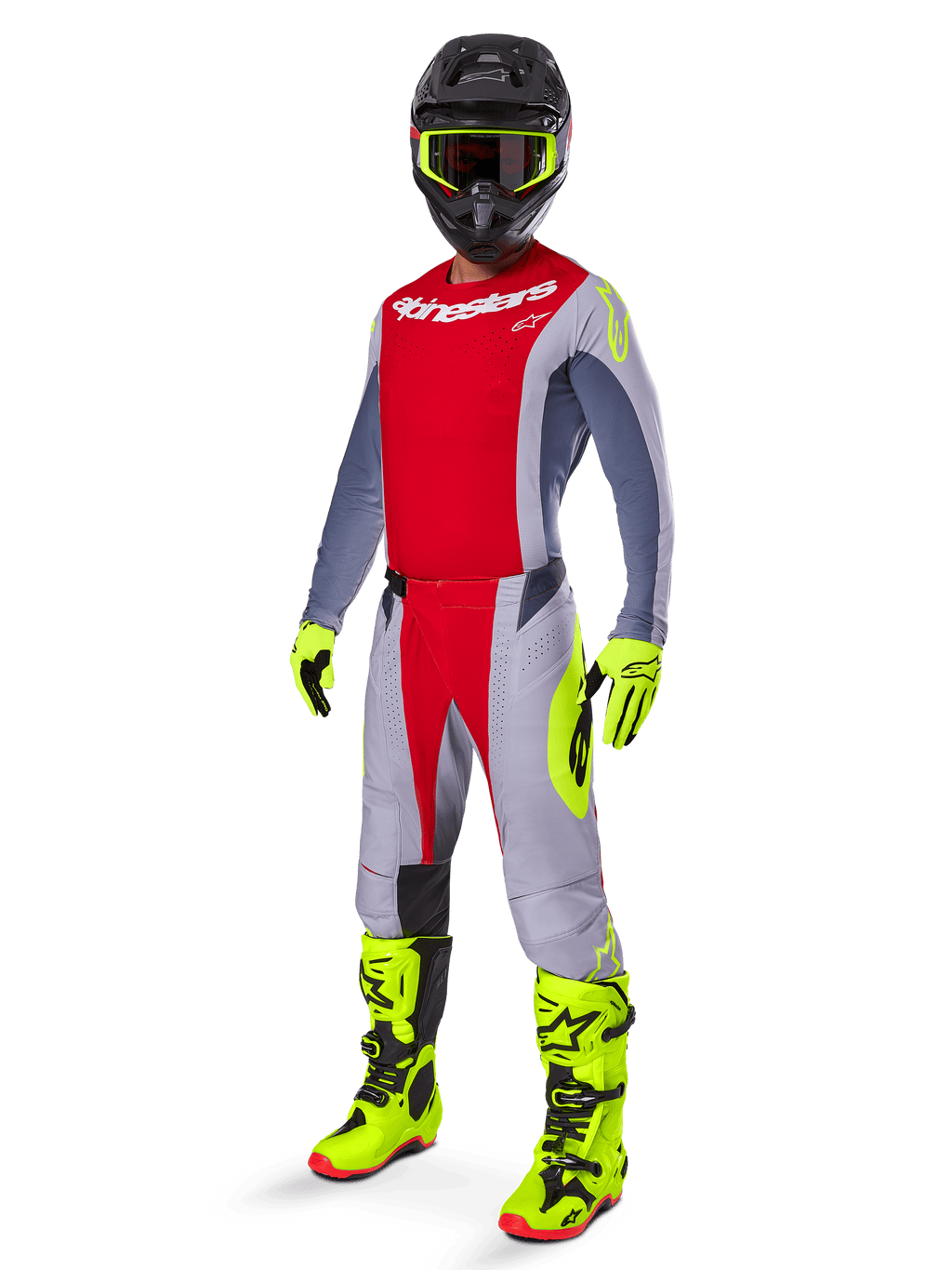 Alpinestars 2025 Techstar Melt Jersey, motorcrossrijder in helderrood en grijs, rode borst en grijze mouwen met fluorescerend gele accenten, bijpassende broek, felgele laarzen en handschoenen, zwarte helm met bril met geel montuur, complete off-road race-uitrusting