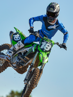 Alpinestars 2025 Racer Veil Jersey, motorcross shirt, blauw en zwart, technische top met lange mouwen, voorzien van abstracte grafische patronen en ademende mesh-secties voor off-road rijden.