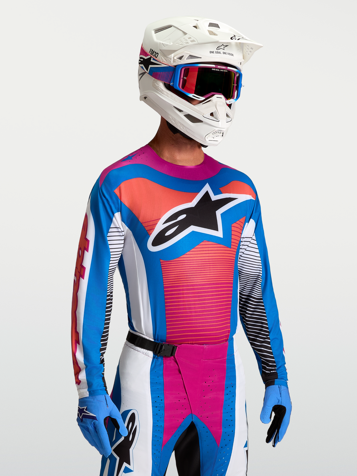Alpinestars Techstar Maven jersey, heren-motorcrossjersey in blauw en Hot Coral, lichte atletische pasvorm voor off-road racing.