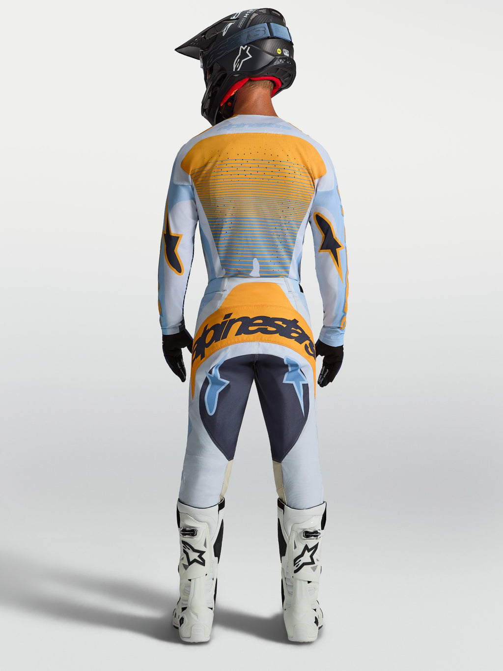 Alpinestars Techstar Maven jersey en MX uitrustingsset, motorcross racing, heren, blauw en oranje, achteraanzicht.