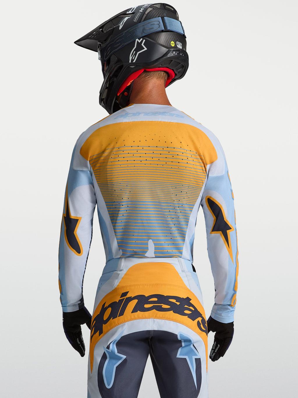 Alpinestars Techstar Maven jersey, heren-motorcrossjersey, blauw en oranje, achteraanzicht met lasergesneden ventilatie.