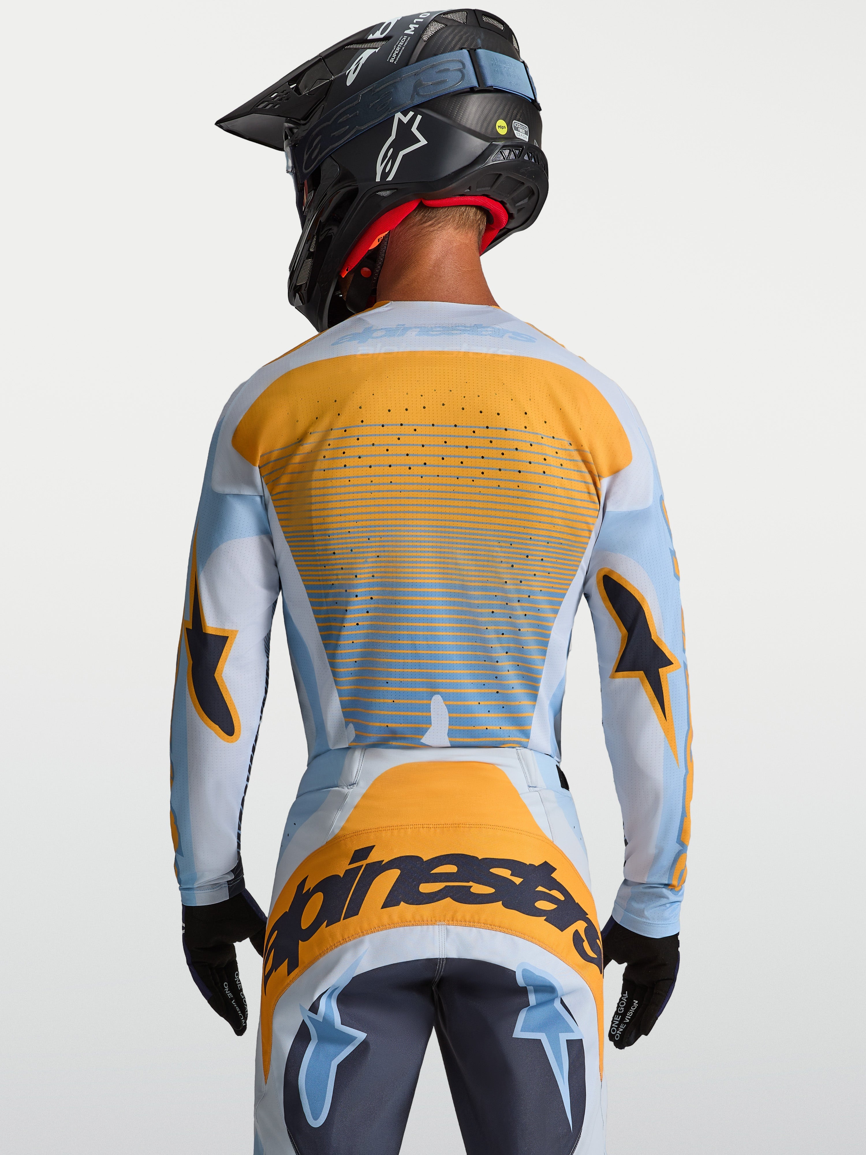 Alpinestars Techstar Maven jersey, heren-motorcrossjersey, blauw en oranje, achteraanzicht met lasergesneden ventilatie.