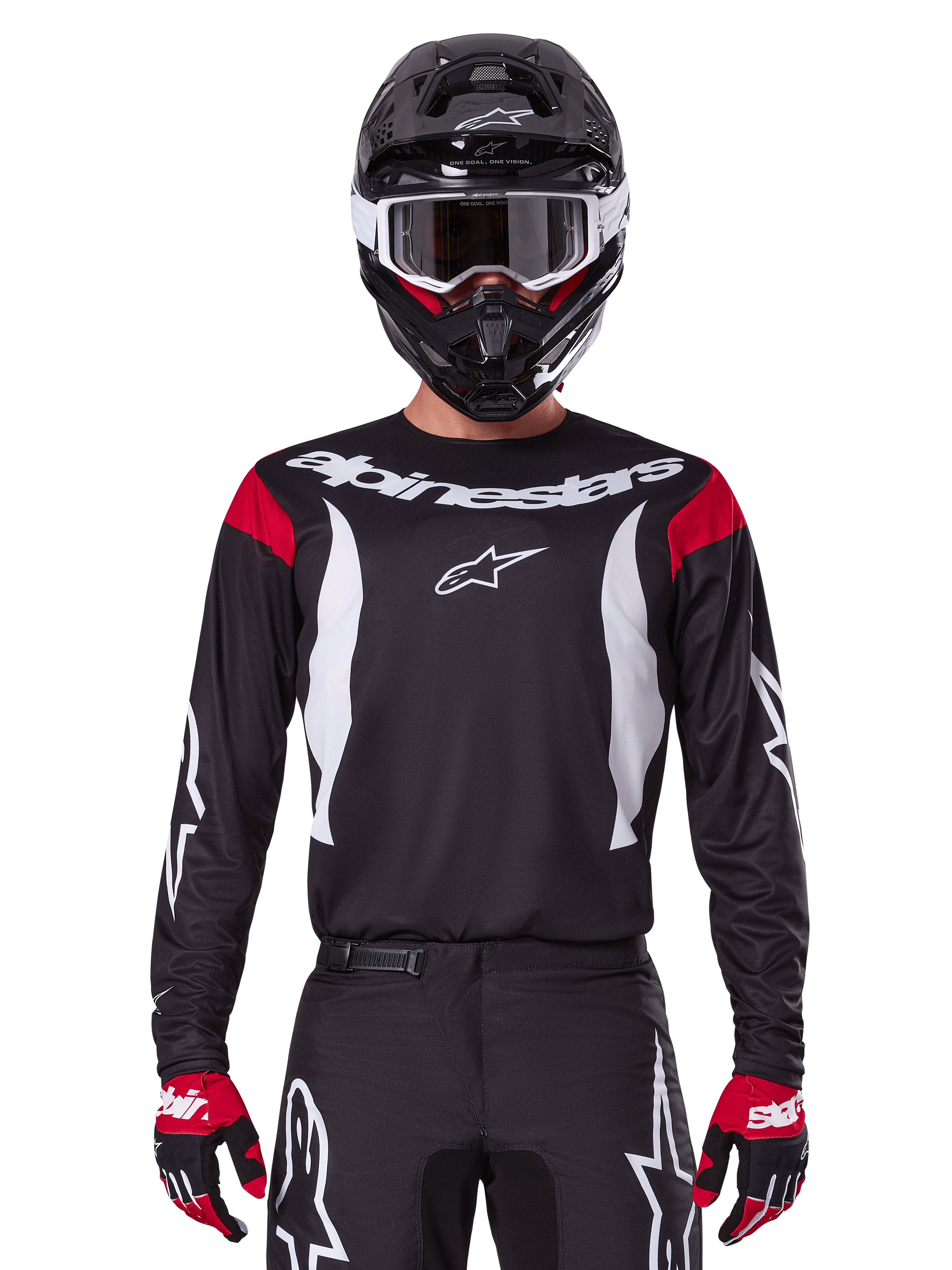 Alpinestars Fluid Haul jersey en kledingset 2025, heren motocrossoutfit, zwart en wit met rode accenten, professionele off-road racekleding inclusief helm en handschoenen.