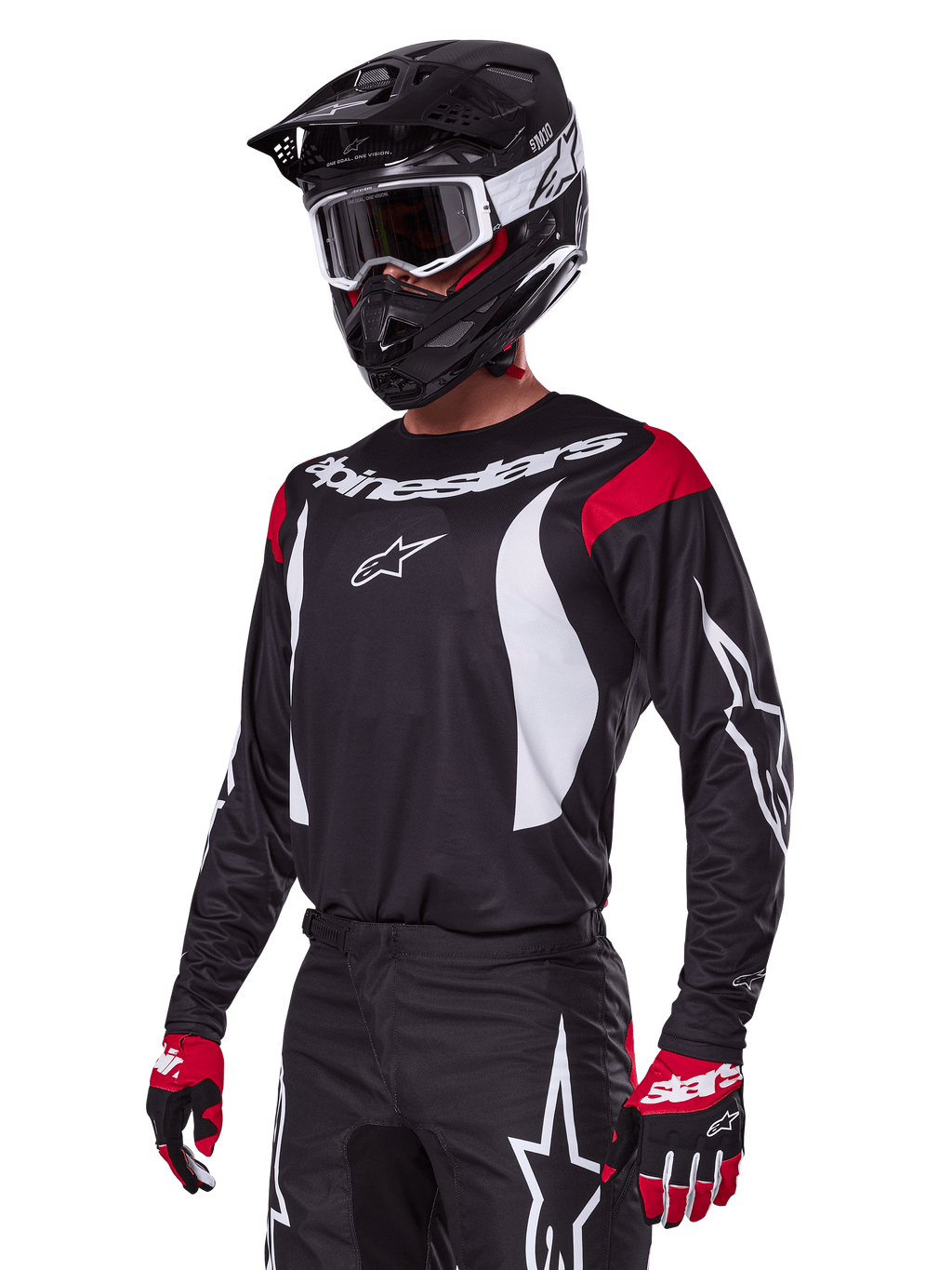 Alpinestars 2025 Fluid Haul Gear Set, motorcross outfit, zwarte jersey met rode schouderpanelen en witte graphics, bijpassende zwarte broek met witte ster-logo's, rode en zwarte handschoenen, zwarte helm met witte accenten en bril, gecoördineerde motorcrossuitrusting