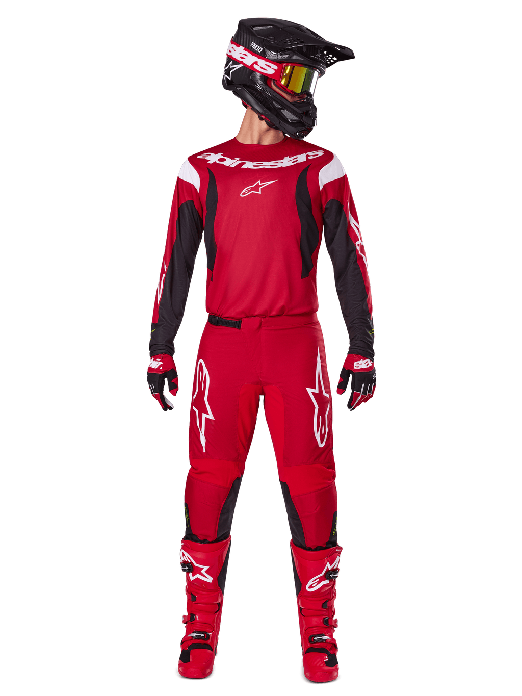 Alpinestars 2025 Fluid Haul Gearset, motorcross outfit in felrood en zwart, rood jersey met zwarte mouwen en witte logo's, bijpassende rode broek met witte sterlogo's, zwarte helm met goudgetinte bril en rode laarzen, complete uitrusting voor off-road rijden
