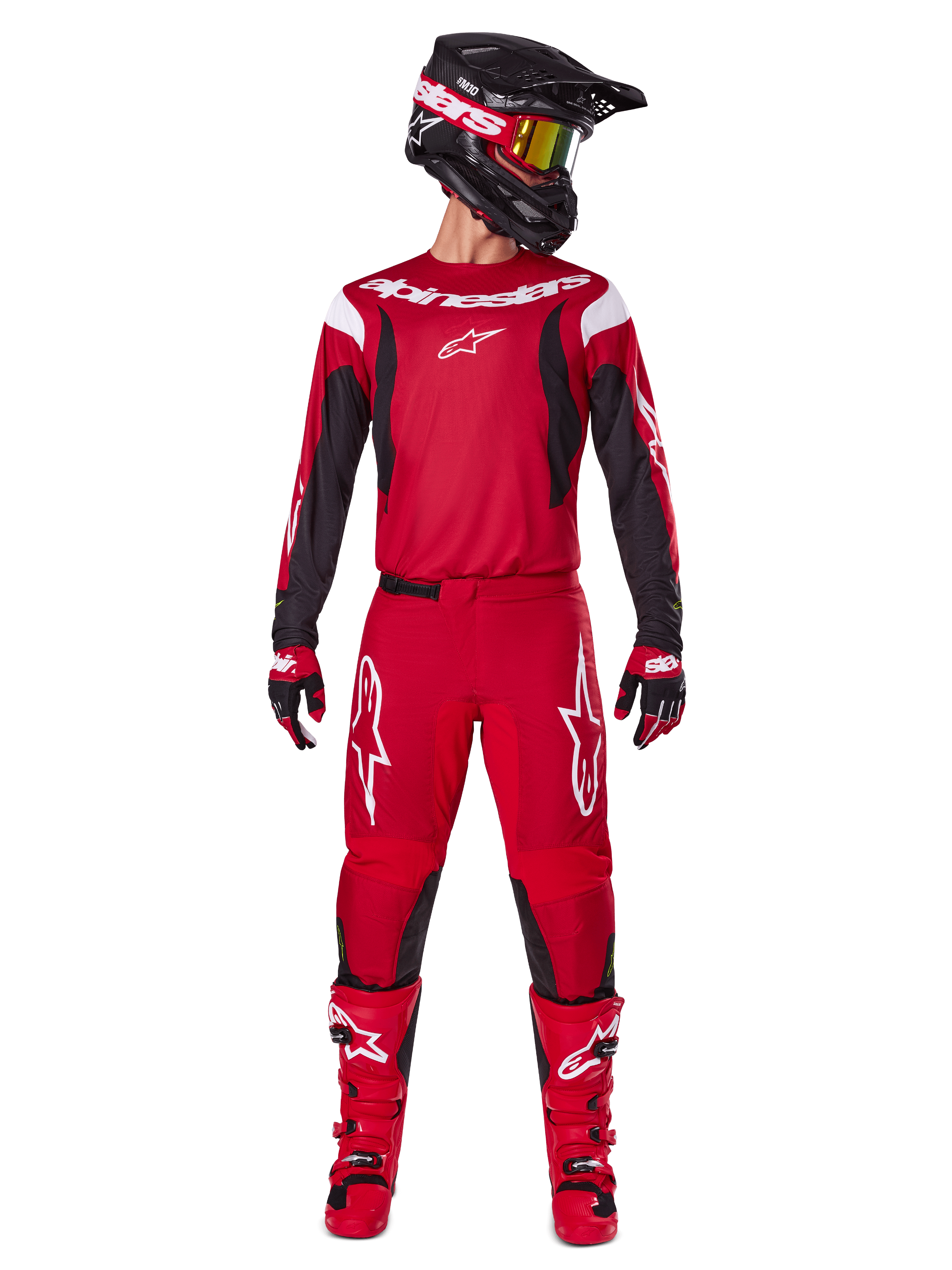 Alpinestars 2025 Fluid Haul Gearset, motorcross outfit in felrood en zwart, rood jersey met zwarte mouwen en witte logo's, bijpassende rode broek met witte sterlogo's, zwarte helm met goudgetinte bril en rode laarzen, complete uitrusting voor off-road rijden
