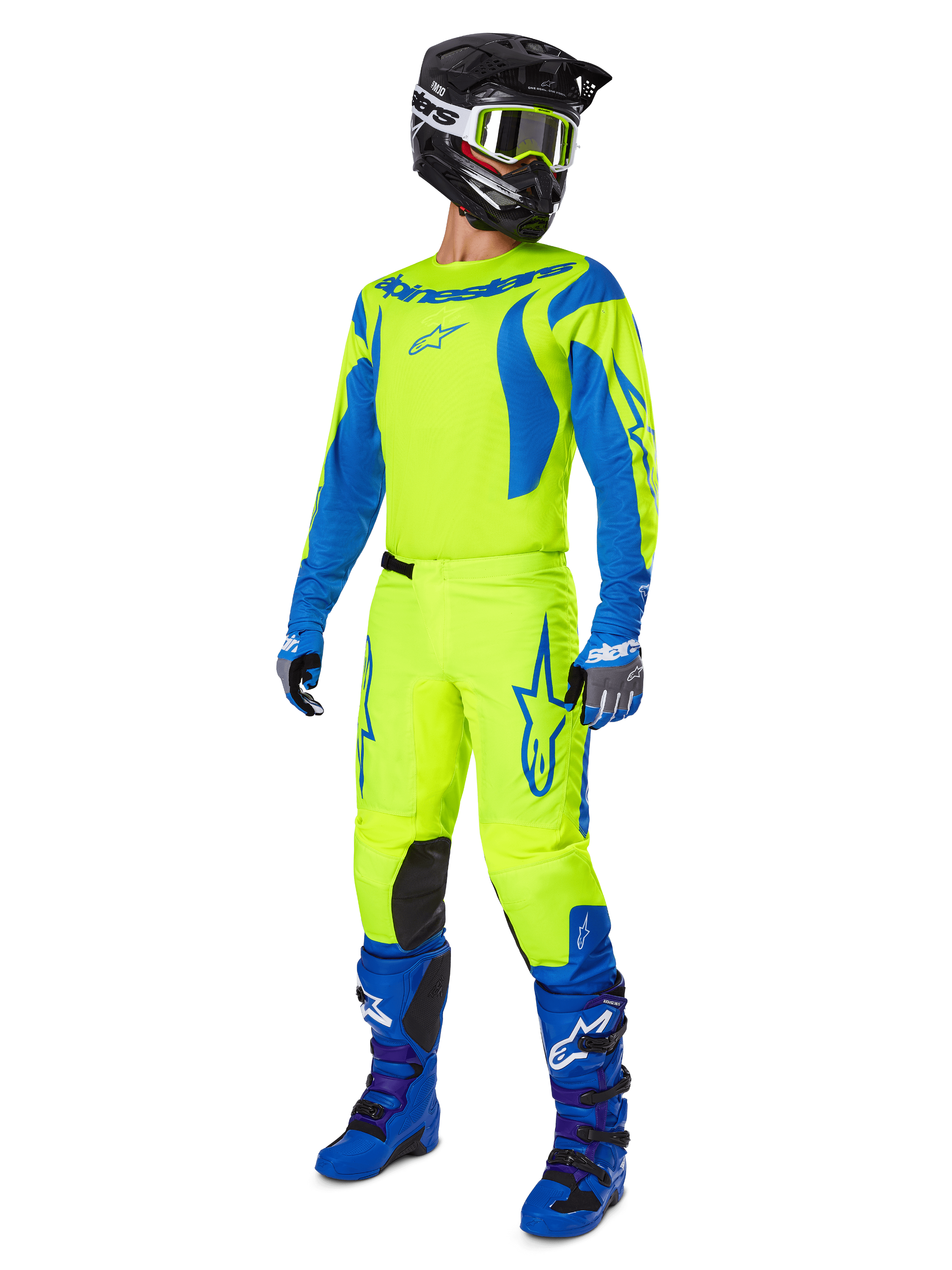 Alpinestars 2025 Fluid Haul motorcrossset, volledige motorcrossuitrusting met neongeel en blauw shirt en broek, zwarte helm, blauwe handschoenen en blauwe off-road laarzen, opvallende gecoördineerde outfit voor motorcross en enduro.