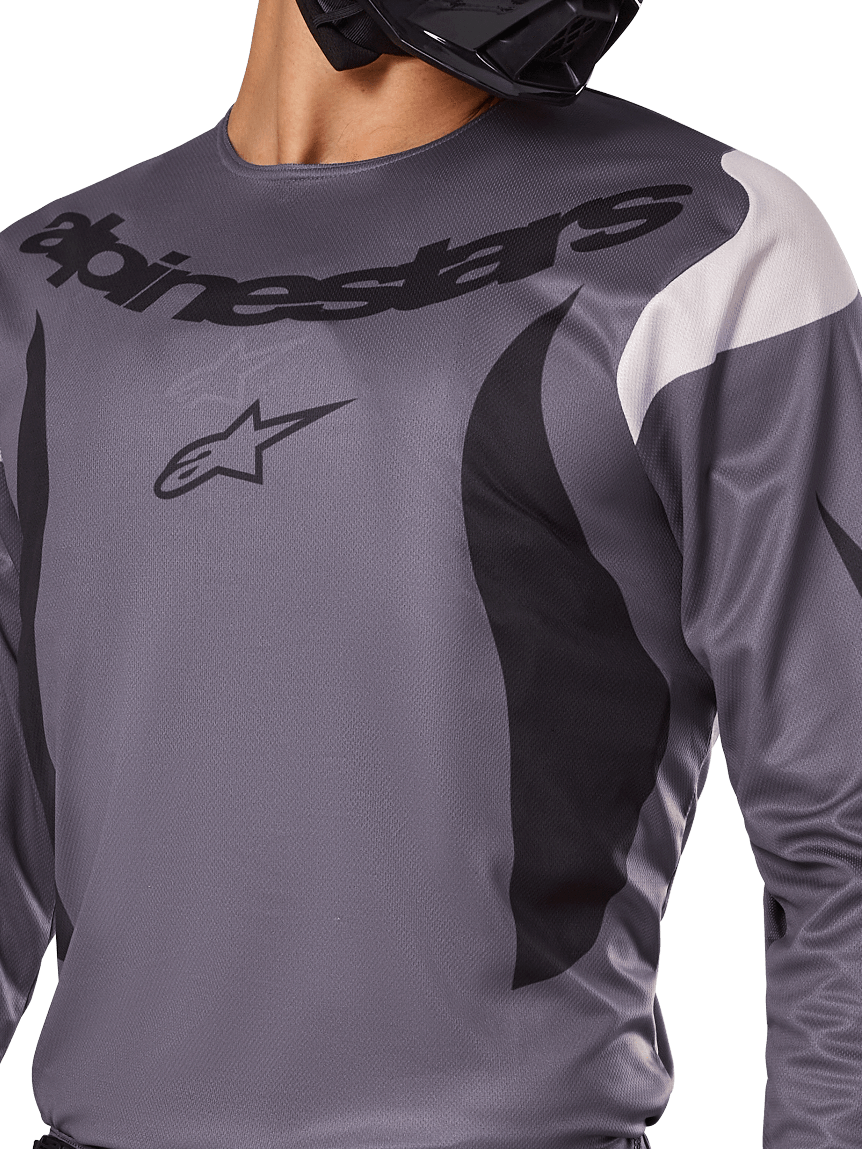 Alpinestars 2025 Fluid Haul Jersey, motorcross shirt, grijs met zwarte en witte accenten, voorzien van het Alpinestars-logo en woordmerk op de borst, sportieve pasvorm voor off-road racen