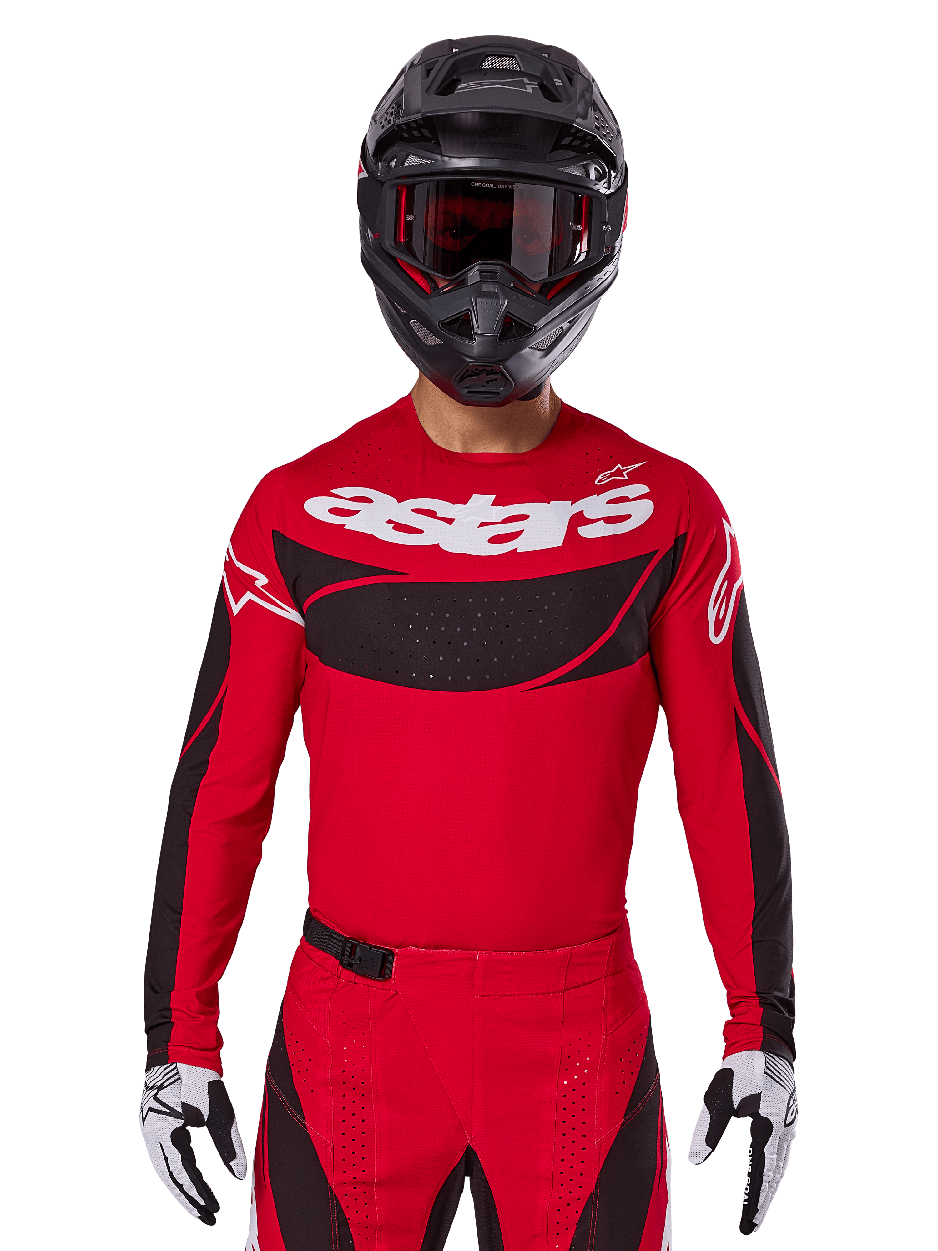 Alpinestars 2025 Techstar Dreem Jersey, motorcrosskleding, helderrood en zwart, met een wit 'astars' logo en zwart geventileerd borstpaneel, gedragen met bijpassende broek, zwarte helm en zwart-witte handschoenen, ontworpen voor professionele off-road racing