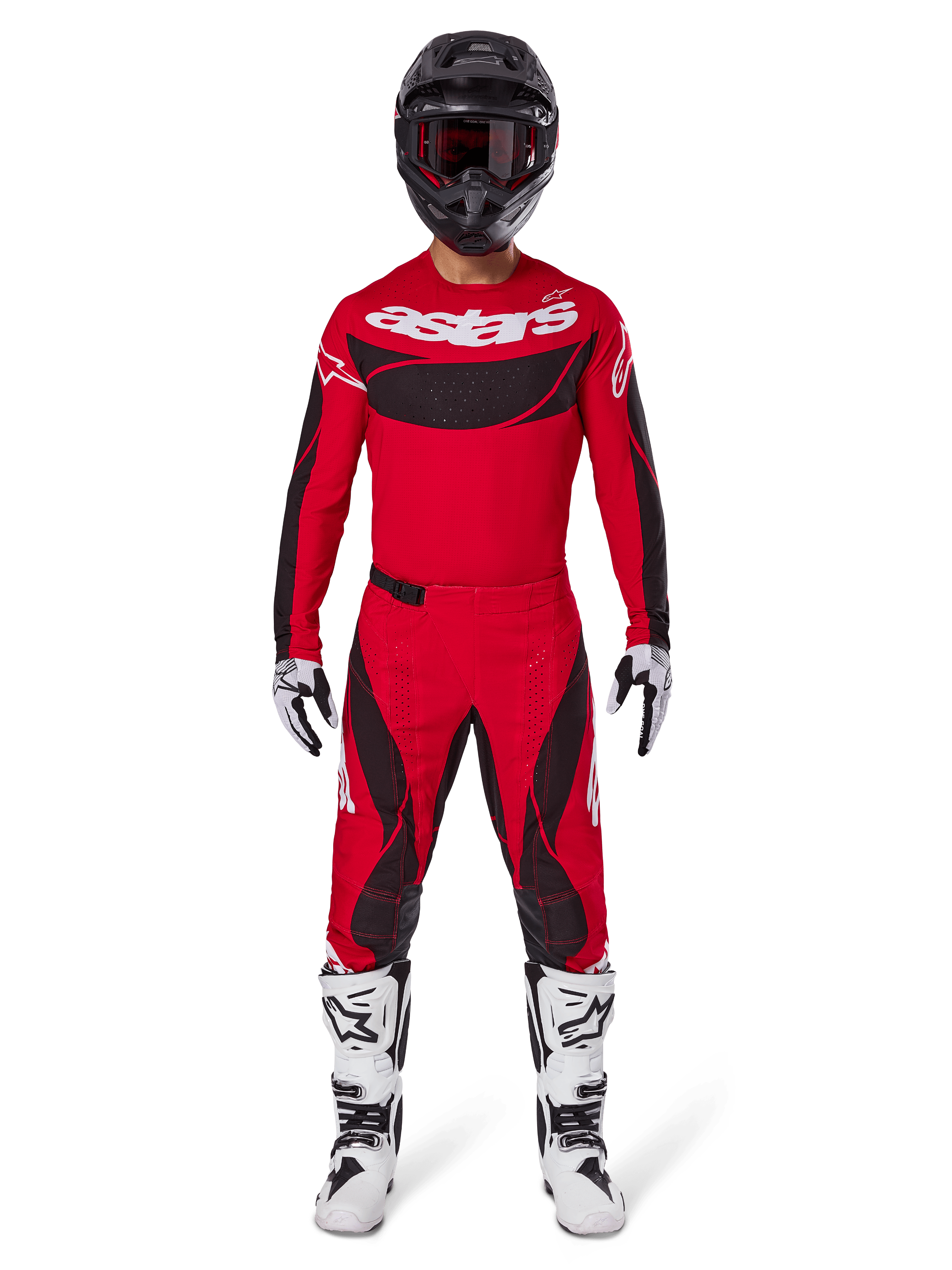 Alpinestars 2025 Techstar Dreem Gear Set, motorcrosser in helderrood jersey met zwarte panelen en witte 'astars' branding, bijpassende rode en zwarte broek, zwarte helm, witte en zwarte laarzen en handschoenen, complete outfit voor off-road competitie