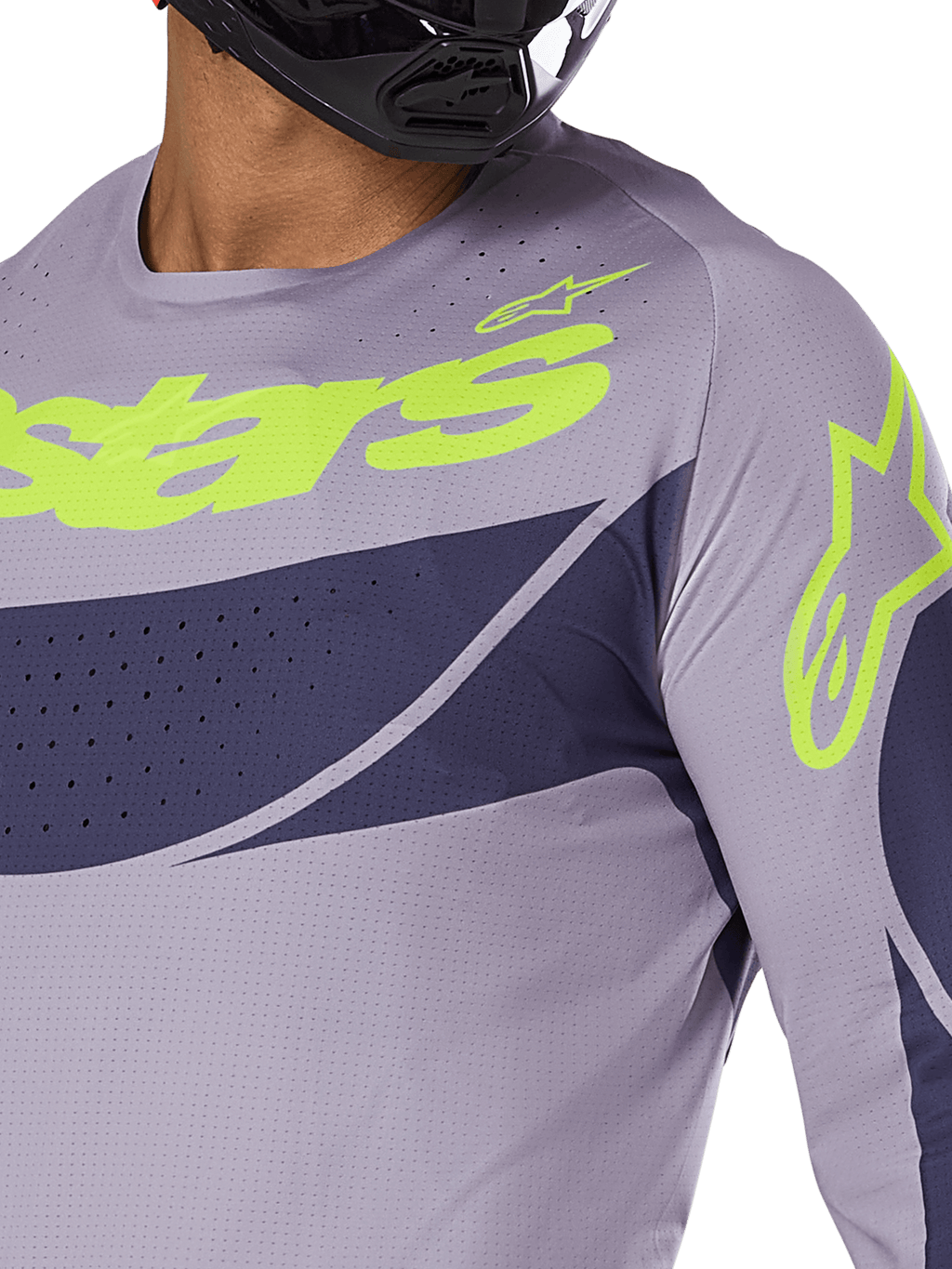 Alpinestars 2025 Techstar Dreem Jersey, motorcross jersey, grijs en marineblauw met fel limoengroen logo, close-up van rijder met zwarte helm, voorzien van laser-gesneden perforaties voor ventilatie